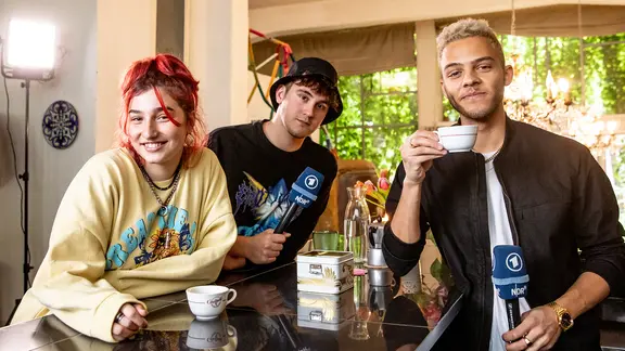 Pia Maria und LUM!X mit Malik Harris.