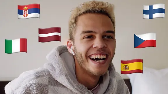 Malik Harris mit den Flaggen von Italien, Serbien, Lettland, Spanien, der Tschechischen Republik und Finnland.